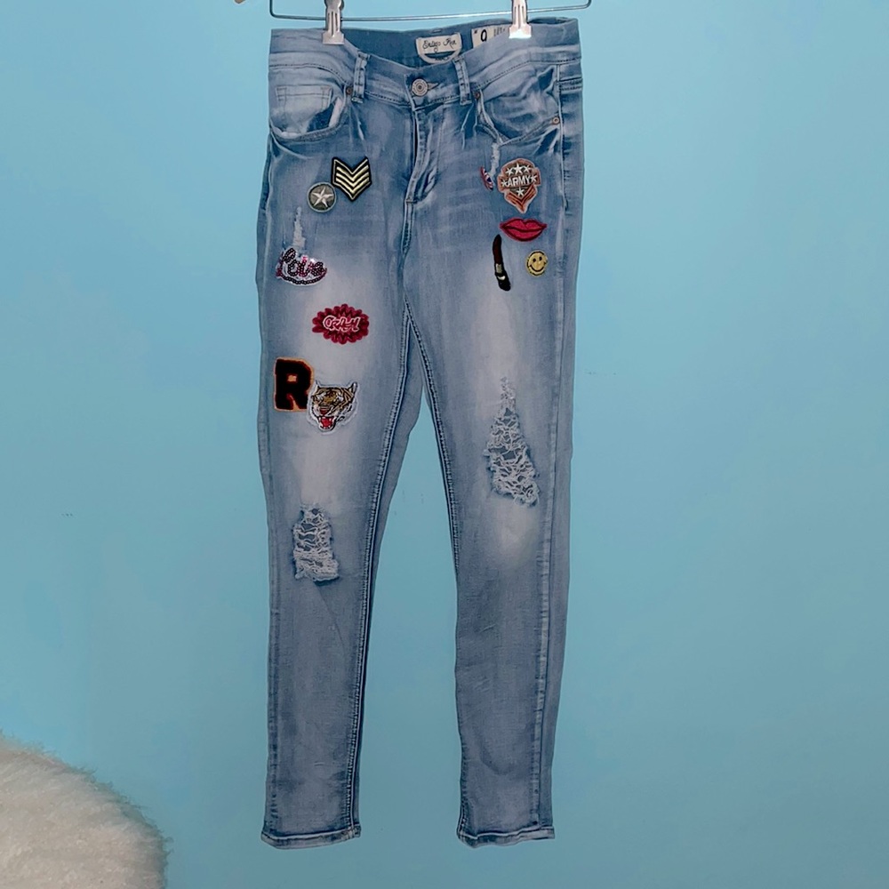 Patch ripped jeans